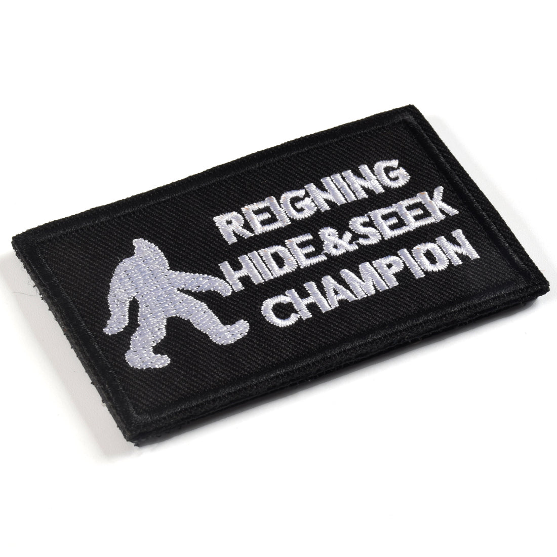 REIGNING HIDE & SEEK CHAMPION Patch, Black